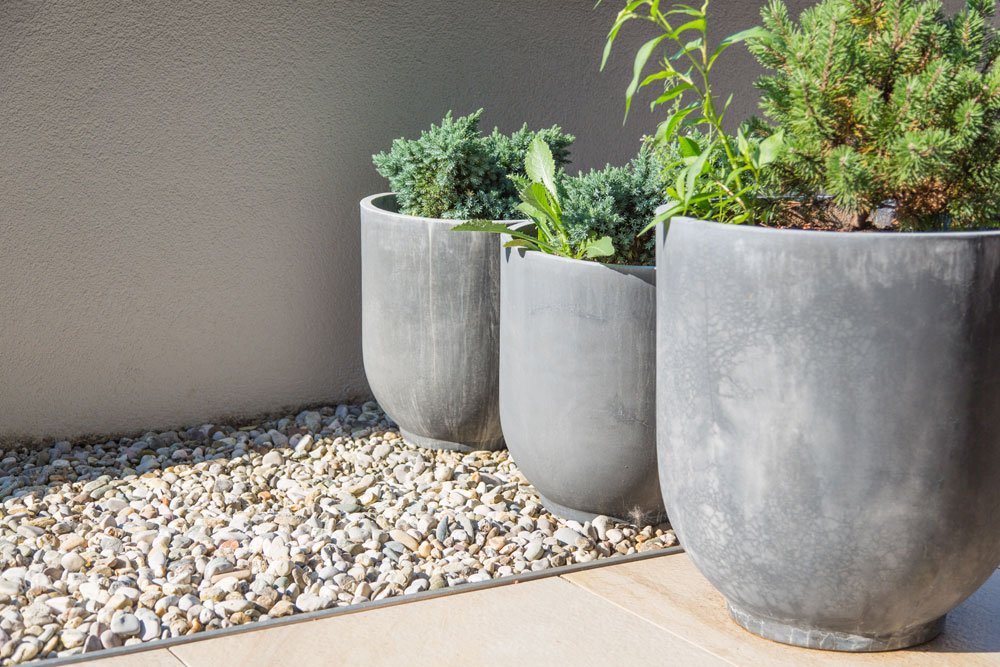 Pflanzenbehälter aus Stein Pflanzkübel Fiberglas Steingemisch